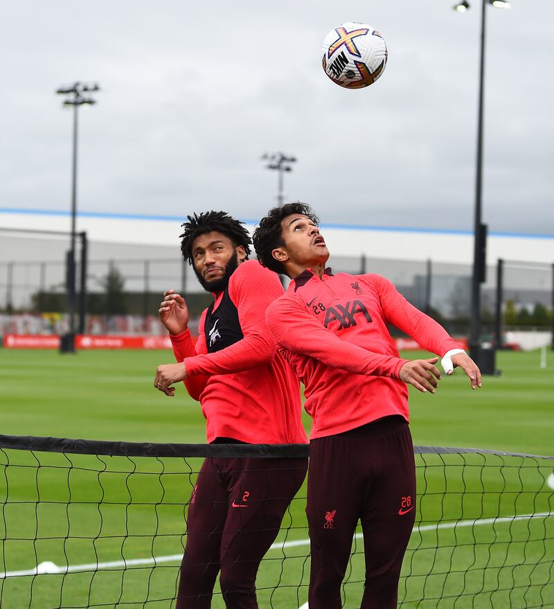 Fabio Carvalho and Joe Gomez of Liverpool during a training session at AXA Training Centre in Kirkby, England. 