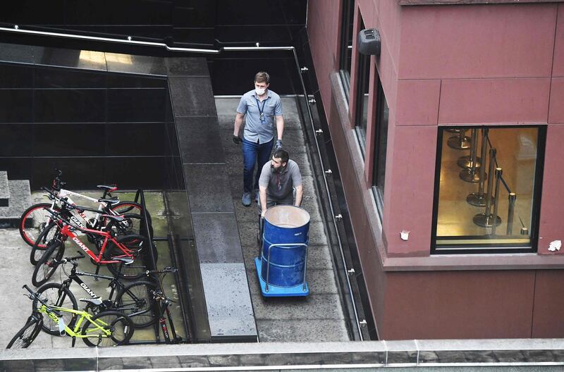 People are seen inside the US consulate in Chengdu. AFP