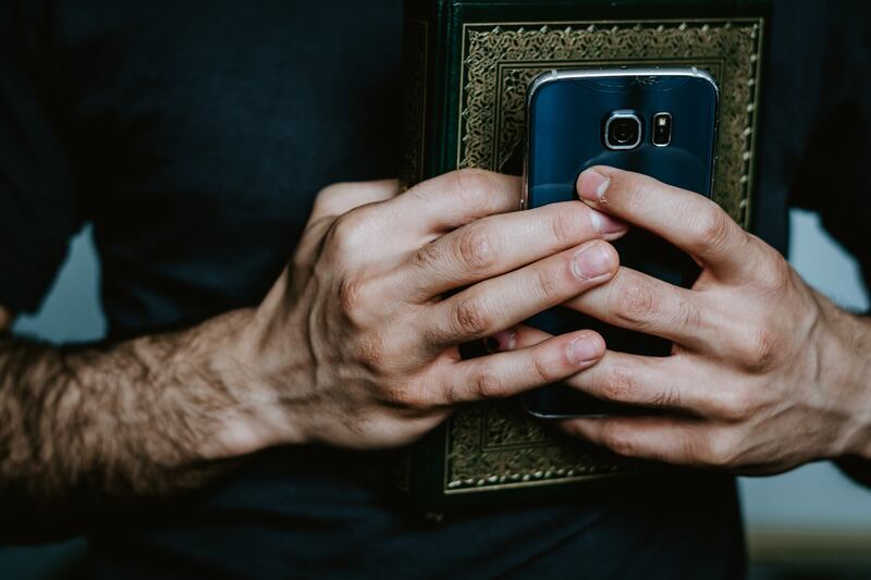 People are increasingly using AI and technology to connect with their faith and learn about others. Photo: Unsplash