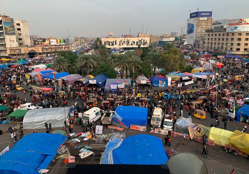 Anti-government protesters inside their camps near Tahrir Square. AP