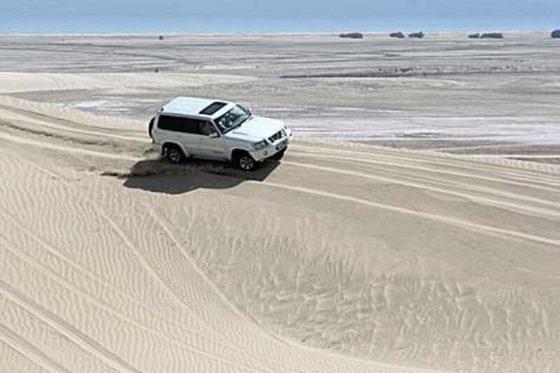 Dune-bashing on the way to the inland sea. Randi Sokoloff / The National