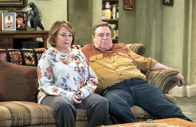 In this image released by ABC, Roseanne Barr, left, and John Goodman appear in a scene from the reboot of "Roseanne," premiering on Tuesday at 8 p.m. EST. (Adam Rose/ABC via AP)