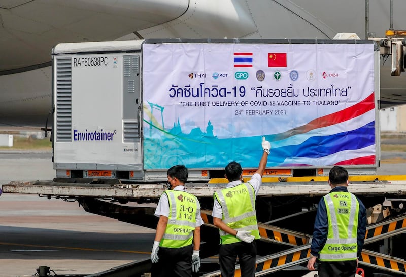 A shipment of the Sinovac vaccine is unloaded from a Thai airways flight at Suvarnabhumi airport in Bangkok, Thailand. AP