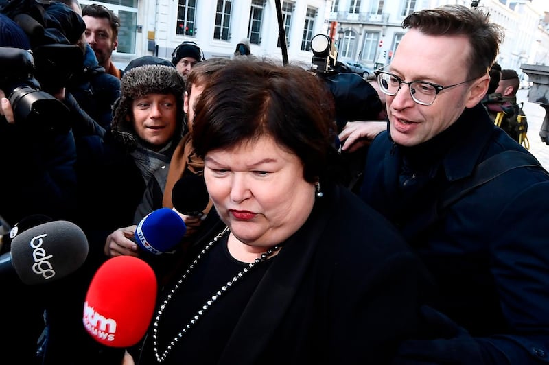 Belgian Minister of Health, Social Affairs, Asylum Policy and Migration Maggie De Block answers journalists' questions as she arrives for a cabinet meeting of the Federal government, in Brussels, on December 9, 2018. Belgium's Prime is left leading a minority administration after the Flemish nationalist party quits the ruling coalition over his support of a UN migration pact. - Belgium OUT
 / AFP / BELGA / DIRK WAEM
