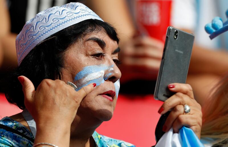 An Argentinian fan waits the round of 16 match between France and Argentina, at the 2018 soccer World Cup at the Kazan Arena in Kazan, Russia, on June 30, 2018. Frank Augstein / AP Photo