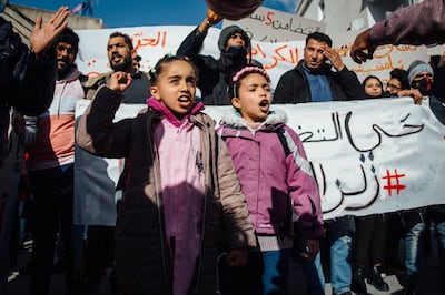 Two young residents of Ettadhaman joined the protests Tuesday, January 26th, leading chants of "Work, freedom, national dignity!" Erin Clare Brown for The National