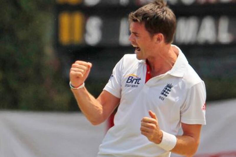 England's bowler James Anderson, right, celebrates the dismissal of Sri Lanka's Lahiru Thirimanne during the first day's play of the second test cricket match between England and Sri Lanka in Colombo, Sri Lanka, Tuesday, April 3, 2012. (AP Photo/Eranga Jayawardena)