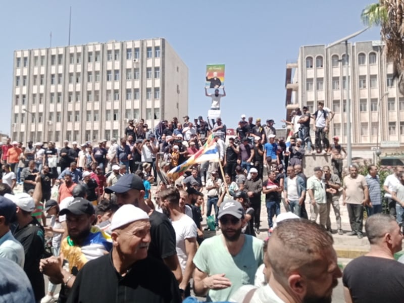 Protests last month against Syrian President Bashar Al Assad in the central square of the mostly Druze south-western city of Suweida. Photo: Suwayda24.