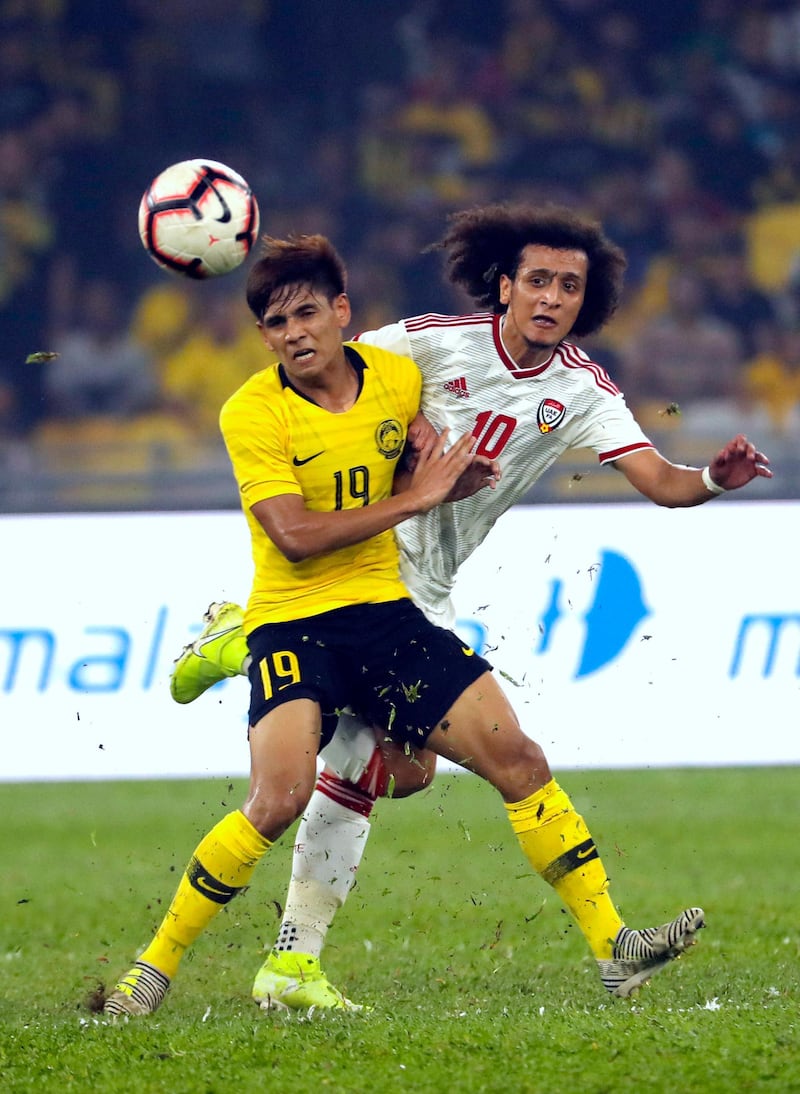 UAE playmaker Omar Abdulrahman, right, made his first competitive outing in 10 months. AP