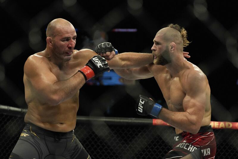 Glover Teixeira throws a punch at Jiri Prochazka during their light heavyweight title fight. AFP