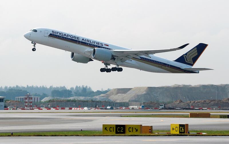 FILE PHOTO: A Singapore Airlines Airbus A350-900 plane takes off at Changi Airport in Singapore March 28, 2018. REUTERS/Edgar Su/File Photo