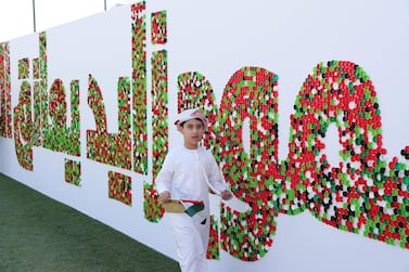 Gems Al Barsha National School for Boys in Dubai won a new world record for the largest bottle cap sentence. Pawan Singh / The National 