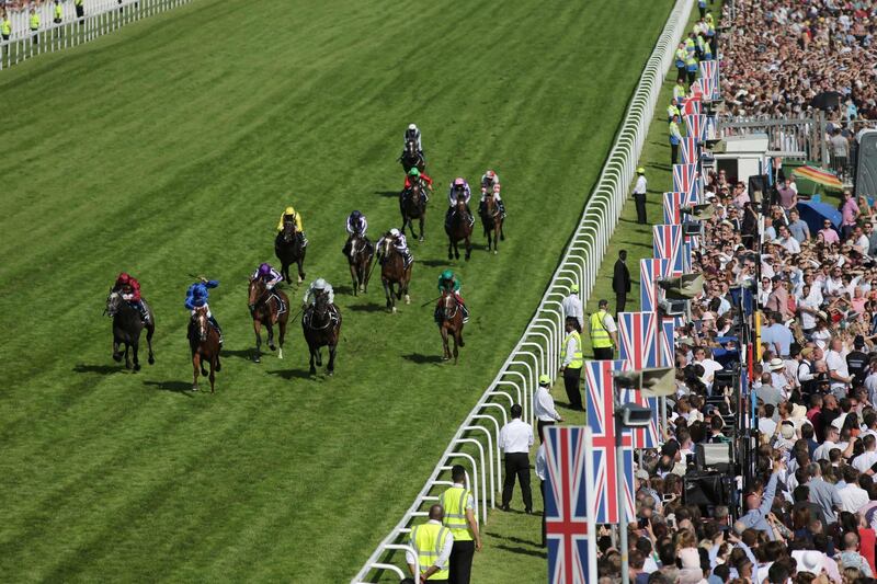 Godolphin celebrated their first win in the Epsom Derby as William Buick rode Masar to victory, much to the delight of Sheikh Mohammed bin Rashid, Vice President of the UAE and Ruler of Dubai, and Sheikh Hamdan bin Mohammed, Crown Prince of Dubai.  Daniel Leal-Olivas / AFP