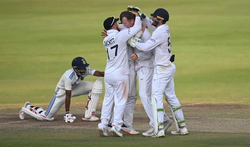 England bowler Tom Hartley celebrates with teammates after taking the wicket of Srikar Bharat in the first Test against India. Getty Images
