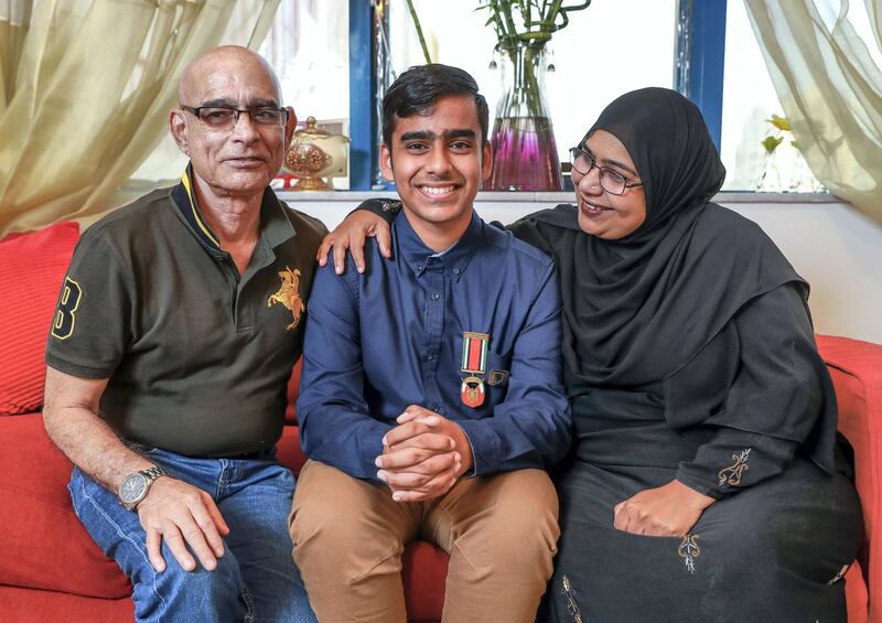 Abu Dhabi, U.A.E., November 5, 2018.  Abu Dhabi student nominated for International Children’s peace prize, Abdul Muqeet with his proud parents, Abdul Sr. and Andaleeb.
 Victor Besa / The National
Section:  NA
Reporter:  Patrick Ryan