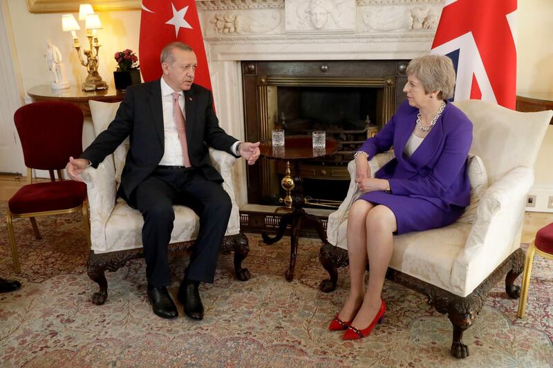 LONDON, ENGLAND - MAY 15:  British Prime Minister Theresa May listens to President of Turkey Recep Tayyip Erdogan at the start of their meeting at 10 Downing Street on May 15, 2018 in London, England. Turkish President Mr Erdogan is in the UK for a three-day visit, which includes a closing lecture at the Tatlidil Forum in Oxford, an audience with The Queen and talks with British Prime Minister Theresa May.  (Photo by Matt Dunham - WPA Pool/Getty Images)