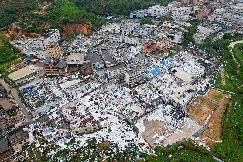 Much of a residential area is razed after a tornado hit Guangzhou, in southern China's Guangdong province. At least five people were killed. AFP