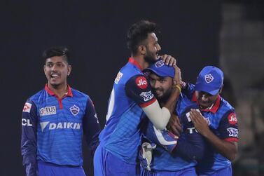 Delhi Capitals players celebrate the wicket of Royal Challengers Bangalore batsman Gurkeerat Singh Mann during VIVO IPL cricket T20 match in New Delhi, India, Sunday, April 28, 2019. (AP Photo/Altaf Qadri)
