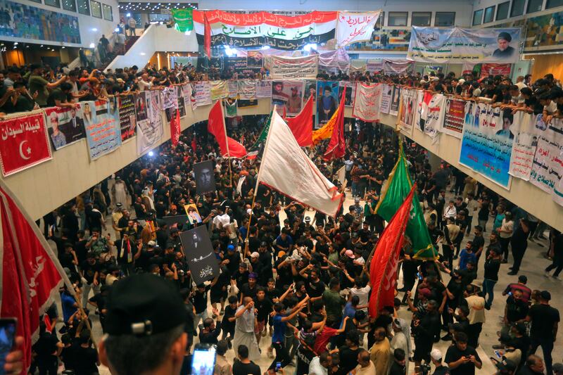 Followers of Shiite cleric Moqtada Al Sadr hold a sit-in protest in Baghdad, Iraq. AP