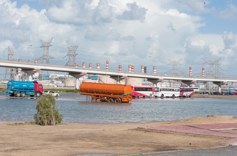 Dubai, United Arab Emirates - Rain water pooling at a truck parking area at Jebel Ali.  Ruel Pableo for The National