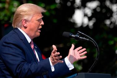 US President Donald Trump delivers remarks on Rolling Back Regulations to Help All Americans on the South Lawn at the White House on July 16, 2020 in Washington,DC. / AFP / JIM WATSON