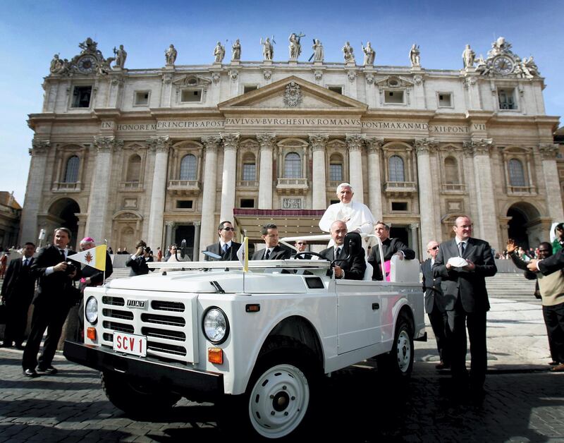 VATICAN CITY, VATICAN CITY - OCTOBER 18:  Pope Benedict XVI is seen in his Popemobile as he waves to the crowds of pilgrims as he moves around Piazza S. Pietro in his popemobile during his weekly audience on October 18, 2006 in the Vatican City, Italy  (Photo by Chris Jackson/Getty Images)