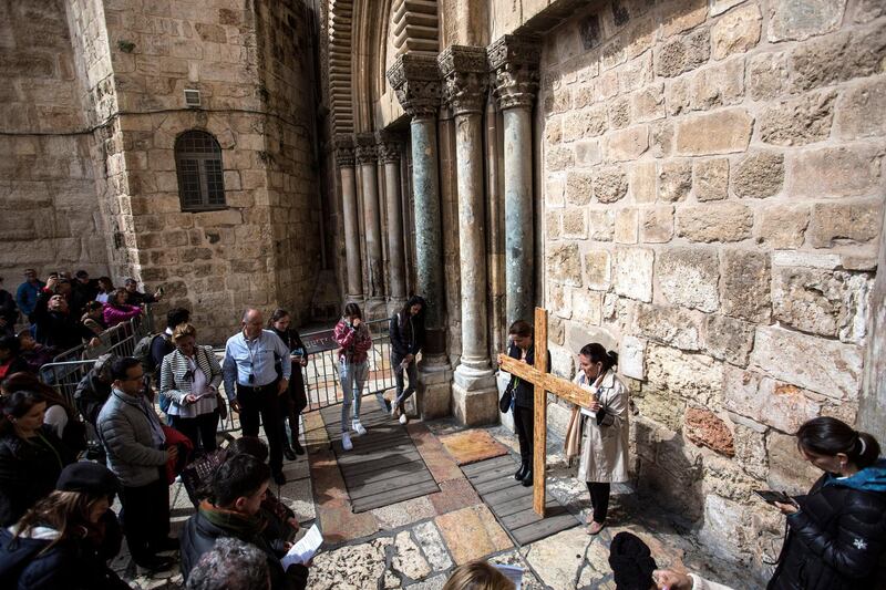 Christian pilgrims from Mexico hold a mass outside the closed Church of the Holy Sepulchre in the Old City of Jerusalem on Monday February 26,2018.The Church of the Holy Sepulchre  remained closed for a second day after church leaders in Jerusalem closed it to protest against Israeli's announced plans by the cityÕs municipality earlier this month to collect property tax (arnona) from church-owned properties on which there are no houses of worship.
(Photo by Heidi Levine for The National).