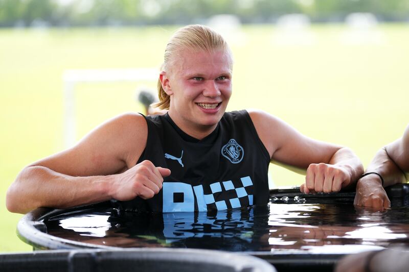 Manchester City's Erling Haaland takes an ice bath during after training at Houston Sports Park on July 18, 2022. Getty