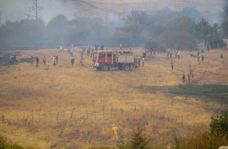 A view of burning trees as extinguishing works continue for the wildfire in Firnanah in Jendouba province of Tunisia. Wildfires in Tunisia's northern Bizerte and Jendouba provinces have destroyed 450 hectares of the countryâs pine and acacia forests.