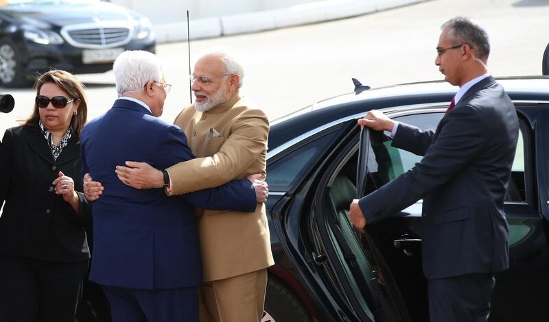 epa06510648 Indian Prime Minister Narendra Modi (2-R) is grteeted by Palestinian President Mahmoud Abbas (2-L), during the welcoming ceremony in the West Bank City of Ramallah, 10 February 2018. Narendra Modi  is on the first day of the three-nation tour taking in Jordan and Abu Dhabi in the UAE.  EPA/ALAA BADARNEH