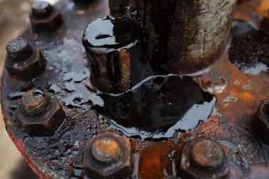 Crude oil leaks from an oil pumping jack in an oil field Russia. Photographer: Andrey Rudakov/Bloomberg