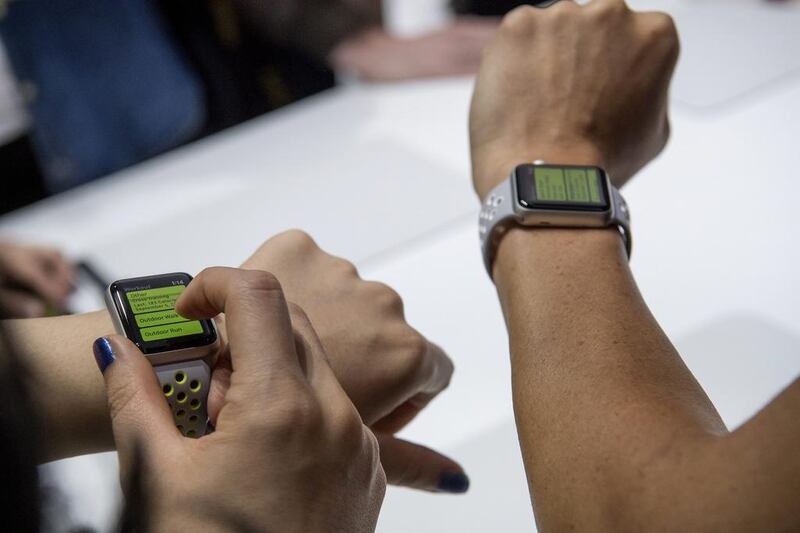 A new Apple Watch, without being tied to the iPhone, is said to be arriving this year as Apple meets with US mobile carriers. David Paul Morris / Bloomberg