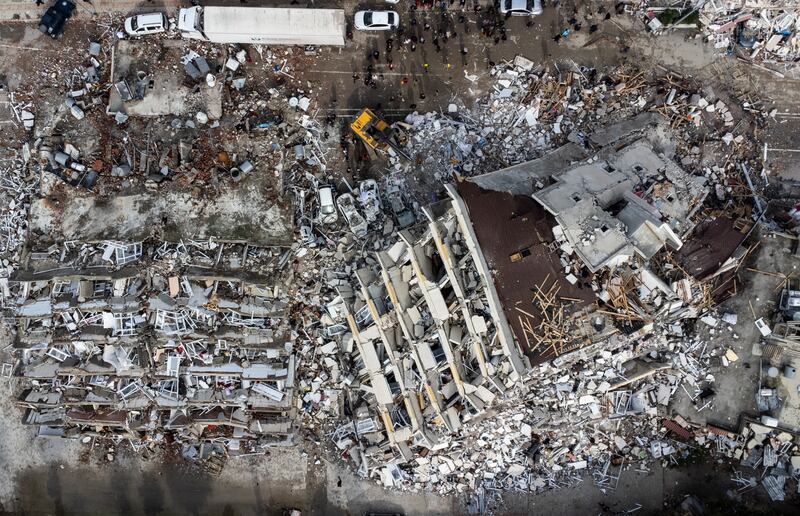 A photo taken with a drone shows an aerial view over collapsed buildings after an earthquake in Hatay, Turkey. EPA