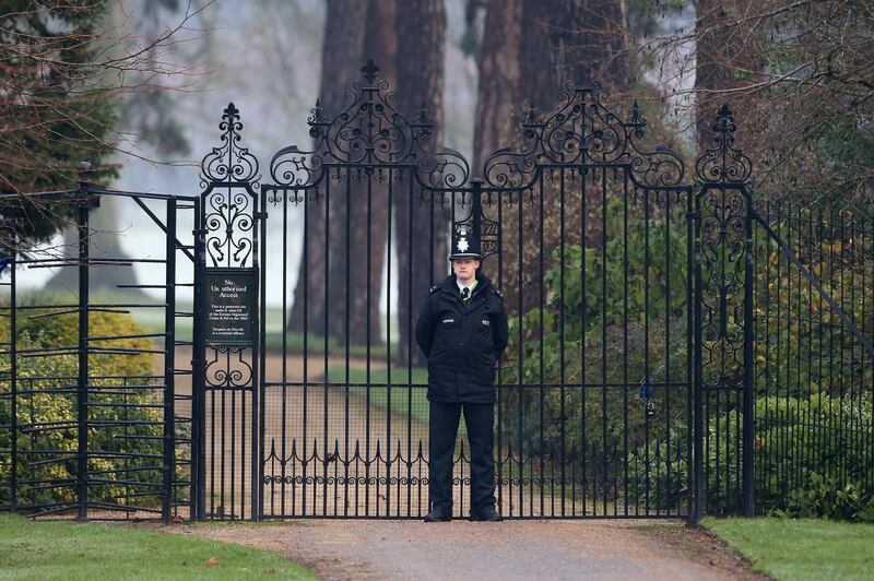 A policeman stands guard ahead of the Christmas Day Church service at Church of St Mary Magdalene on the Sandringham estate on December 25, 2018 in King's Lynn, England. Getty