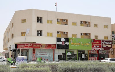 AJMAN , UNITED ARAB EMIRATES , JULY 26 – 2018 :- View of the shops on Sheikh Ammar street in Al Muwaihat area in Ajman.  ( Pawan Singh / The National )  For News. Story by Salam Al Amir