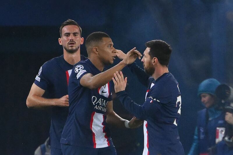 Paris Saint-Germain's Argentine forward Lionel Messi celebrates with Kylian Mbappe after scoring the opening goal in the 7-2 Champions League win against Maccabi Haifa at the Parc des Princes in Paris on October 25, 2022. AFP