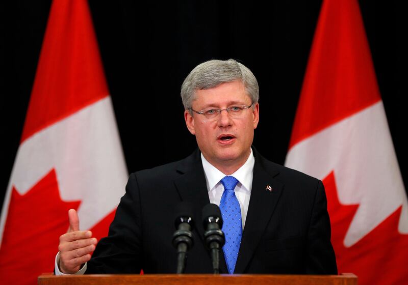 Canadian Prime Minister Setphen Harper answers questions on the train explosion in Quebec in Calgary, Alberta, July 6, 2013. REUTERS/Todd Korol  (CANADA - Tags: POLITICS DISASTER) *** Local Caption ***  TAK02_CANADA-TRAINS_0706_11.JPG
