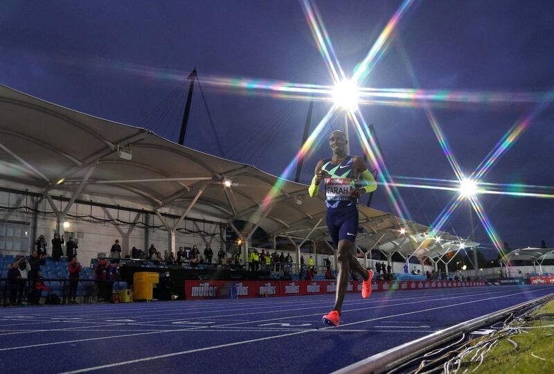 Mo Farah crosses the finish line, failing to achieve the Olympic qualifying time. PA