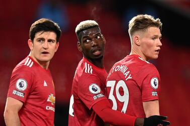 Manchester United's Paul Pogba stands in the wall with teammates Harry Maguire and Scott McTominay during the Premier League match against Manchester City at Old Trafford. AP