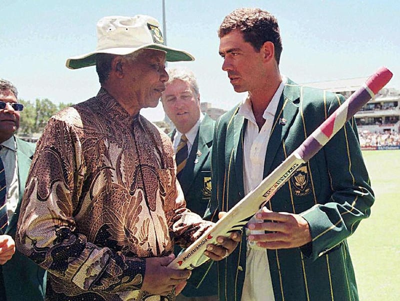 South African President Nelson Mandela with  South Africa cricket captain, Hansie Cronje, in 1997. AFP