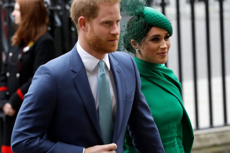 FILE - In this Monday, March 9, 2020 file photo, Britain's Harry and Meghan the Duke and Duchess of Sussex arrive to attend the annual Commonwealth Day service at Westminster Abbey in London. Prince Harry has repaid 2.4 million pounds ($3.2 million) in British taxpayersâ€™ money that was used to renovate the home intended for him and his wife Meghan before they gave up royal duties. A spokesman on Monday, Sept. 7, 2020 Harry has made a contribution to the Sovereign Grant, the public money that goes to the royal family. (AP Photo/Kirsty Wigglesworth, file)