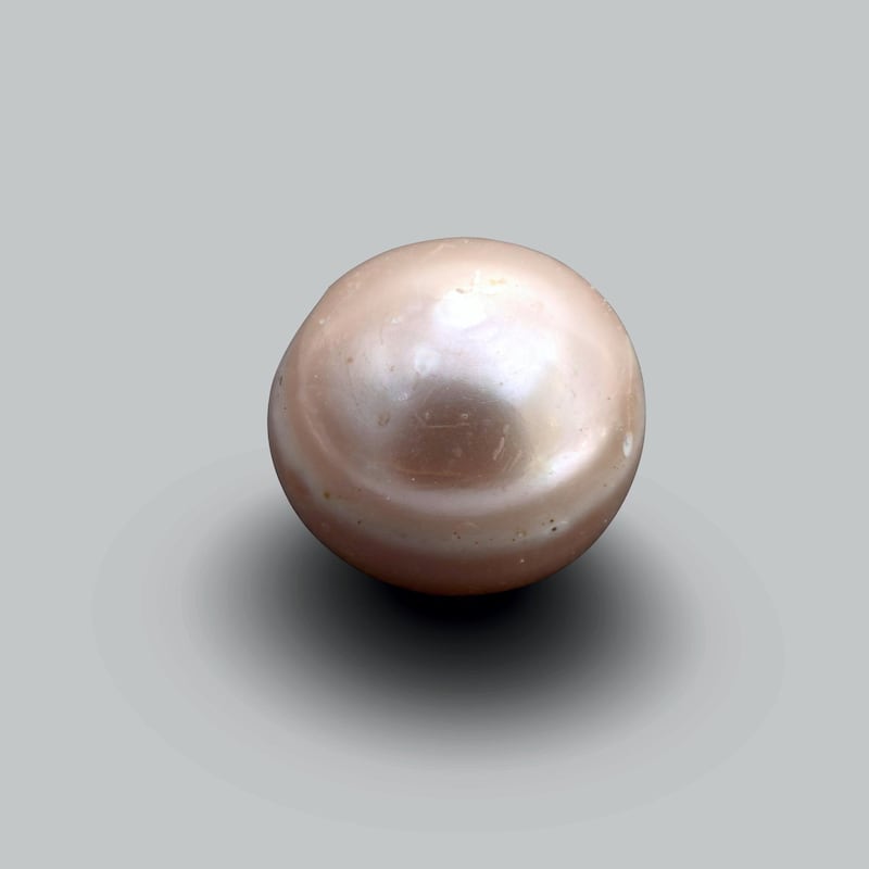 Natural Pearl
c. 5800 BCE, Marawah, United Arab Emirates
3 mm (diameter)
HE.2017.00001
Department of Culture and Tourism - Abu Dhabi
 
Description:
Marawah Island is home to one of the most important archaeological sites in the United Arab Emirates. It provides significant evidence to help us better understand the human communities that lived in the region during the Neolithic period, some 8,000 years ago. The site is comprised of at least seven mounds and excavations in some of them have revealed stone houses dating to c. 6000 BCE. These houses were used as burial chambers during later periods. Within one of the chambers, fragments of the oldest known human skeleton in the emirate of Abu Dhabi were found.
It is, however, the discovery of a complete natural pearl, which dates to the period when the structures were used as houses, that is of enormous importance. Carbon 14 analysis on a sediment sample associated with the pearl indicates a date between 5,800 and 5,600 BCE. Prior to this discovery, the oldest known pearls in the UAE came from a site in Umm Al Quwain and one near Jebel al-Buhais in Sharjah. The Marawah Pearl is older than these making it the world’s oldest known pearl. It indicates that pearls were already gathered in the UAE  8,000 years ago.