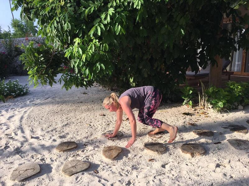 The training involves taking on several animal poses, such as bear crawls. Rosemary Behan