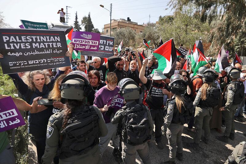 Israeli forces block Palestinian and Israeli peace activists at Huwara in the occupied West Bank after deadly violence by Israeli settlers. AFP