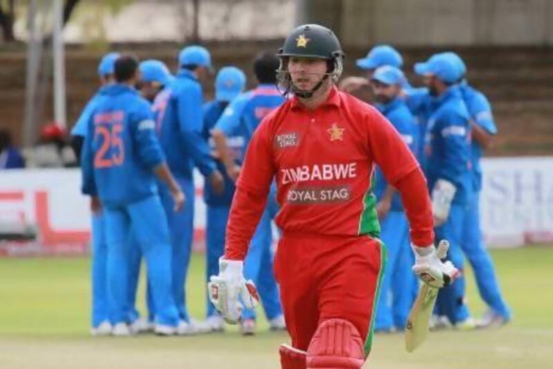 The Zimbabwe captain Brendan Taylor leaves the field after scoring nought against India in yesterday's fifth ODI. The hosts lost all five games with Taylor laying the blame at the batsmen's feet. Tsvangirayi Mukwazhi / AP Photo
