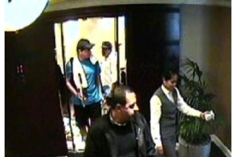 In an image captured by a CCTV camera in the Al Bustan Rotana in Dubai, Mahmoud al Mabhouh, front, is followed by two men suspected of involvement in his murder on January 19. AFP Photo