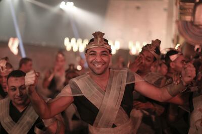 Performers take part in the reopening ceremony of the Avenue of Sphinxes. AP