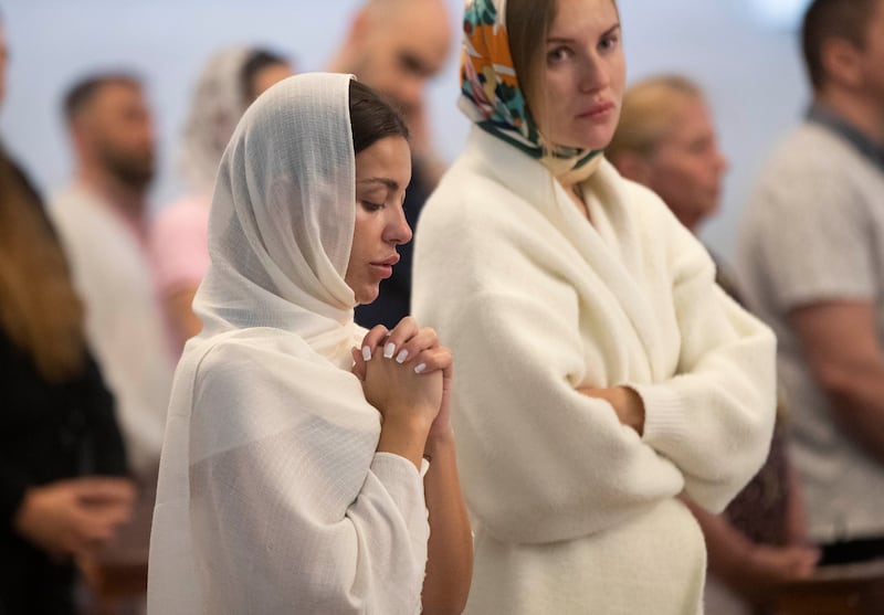 Ukrainians living in the UAE mark Orthodox Easter Sunday at the St. Joseph’s Cathedral in Abu Dhabi. Photos: Ruel Pableo for The National