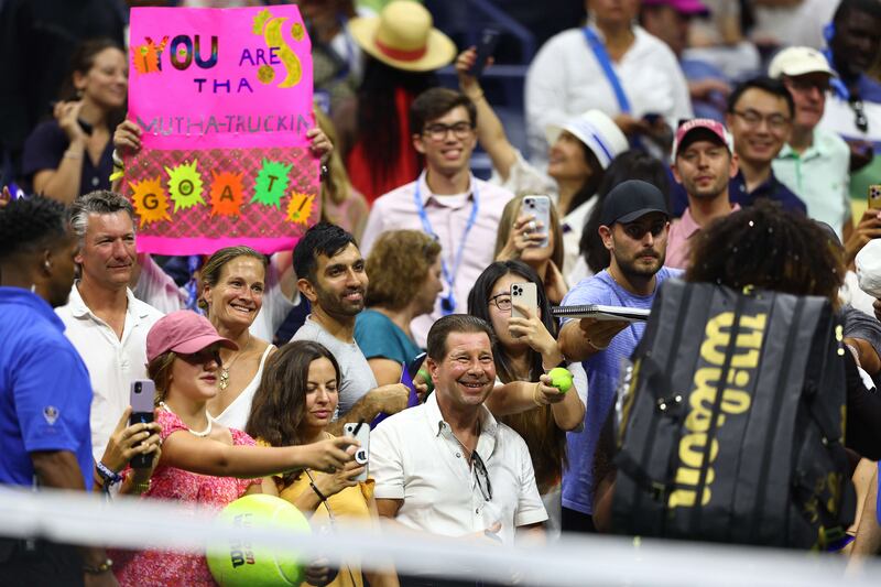 Serena Williams signs autographs. AFP