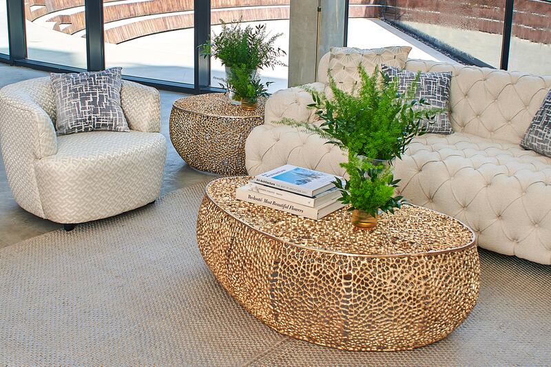 A coffee table usually is the central focus of the room, so choose one that suits your needs and your style. Photo: Aura